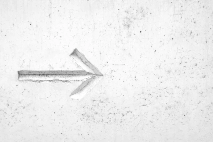 Direction arrow representing growth and forward progress at Satyasetu Club